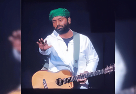 Arijit Singh's Shocking Concert Moment: Watch Him Stand Up for a Fan!